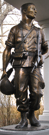 Vietnam soldier bronze sculpture, Plainview Memorial, Big Piney, WY, Monumental life-size bronze statues of Medal of Honor recipients, including Sp5c Clarence E. Sasser, life-size bronze statue of a Gold Star Mom, 40-ft. Brazoria County Ring of Honor in Angleton, Texas; MOH Pfc. Emory L. Bennett, Riverside Park, Cocoa, FL; portrait bronze sculpture of MOH Marine Kenneth Worley.  Created by Tom White, figurative monumental bronze sculptor, public war memorials honoring soldiers, military sculptures - Army, Air Force, Navy, Marines, Coast Guard, historical war memorials, Civil War monuments, Buffalo soldiers, commission a sculpture of a soldier hero, heroic military sculptures