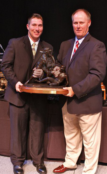 Jedd Gyorko 2010 recipient of College Baseball Foundation's Brooks Wallace Award for Shortstop Player of the Year designed by Tom White, Little League baseball sculptures in bronze, baseball ballpark statues and monuments, sports sculptures, public sports monuments, monumental bronze sculptures, bronze sculptures of boys playing baseball, commission sports award trophies