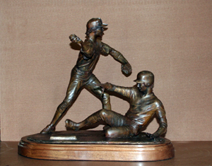 College Baseball Foundation's Brooks Wallace Award for Shortstop Player of the Year designed by Tom White, Little League baseball sculptures in bronze, baseball ballpark statues and monuments, sports sculptures, public sports monuments, monumental bronze sculptures, bronze sculptures of boys playing baseball, commission sports award trophies