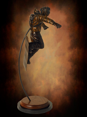 Bronze tabletop Snowboarder sculpture, snowboarding award trophy, custom designed trophies by Tom White, original sports trophies, action snowboard sculpture, figurative sports sculptures, portrait bronze sports statues, public sports monuments, Little League baseball sculptures in bronze, baseball ballpark statues and monuments, sports arena statues, monumental bronze sports sculptures, bronze sculptures of boys playing baseball, commission sports award trophies, skiing statues